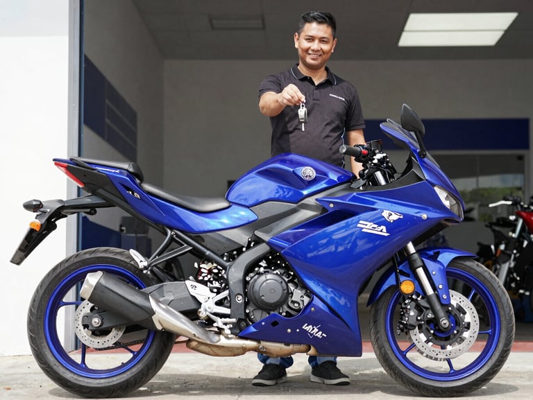 A happy customer receiving the keys to a brand new blue Yamaha motorcycle inside the clean showroom on Cra 20, bright natural daylight.