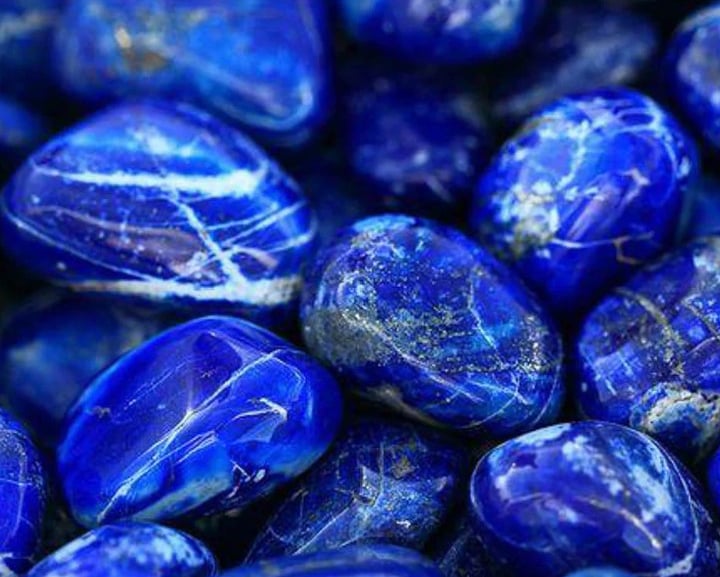 a pile of blue lapel stones