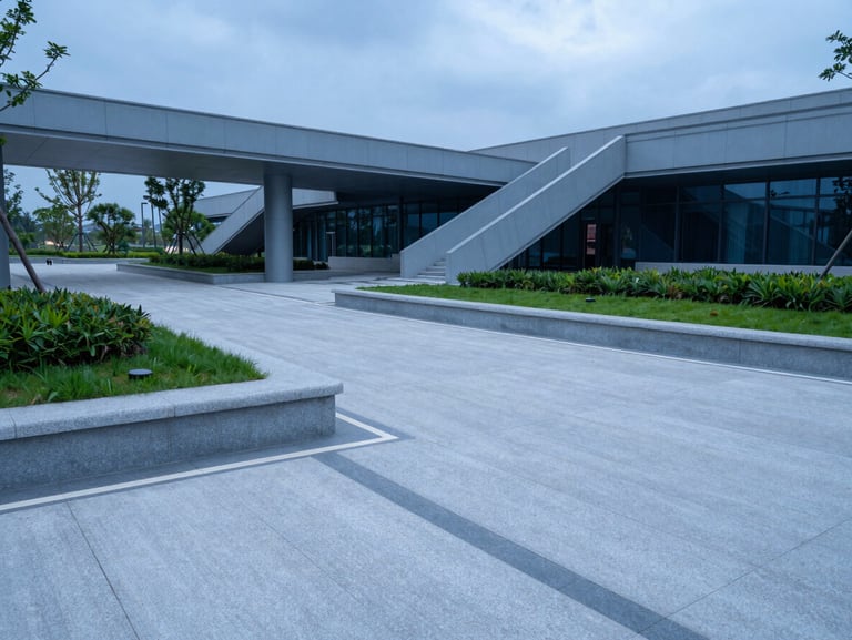 Urban public plaza with modern concrete paving, integrated green areas, and clean geometric infrastructure, bright overcast day