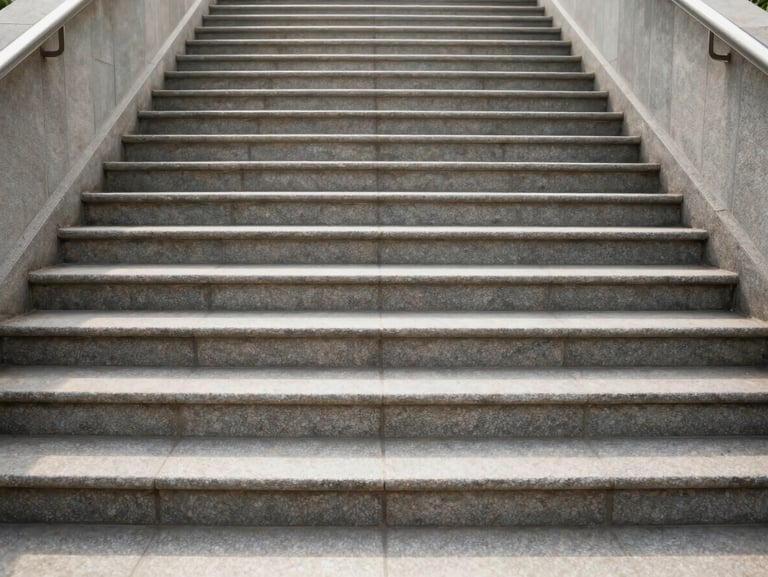 Symmetrical shot of a spotless, freshly mopped stone stairwell in bright morning light, clean lines, professional finish