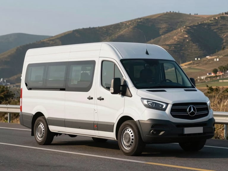 A spotless white premium multi-utility vehicle parked on a clean paved highway during bright morning light, spacious cabin visible through clear windows, scenic rolling hills in the background.