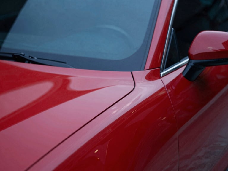 Close-up of a premium vehicle post-repair, flawless red paint reflecting sharp studio lights, ultra-detailed macro focus, 35mm