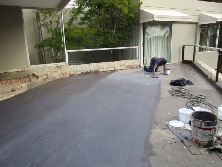 Precision waterproofing membrane application to for a perfect seal for balcony slab, Fourways Gardens, Sandton