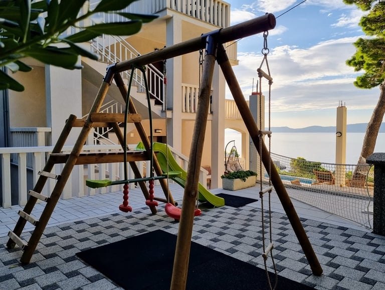 Children's swing and slide with Adriatic sea view, Easy Living Holiday Home, Lokva Rogoznica