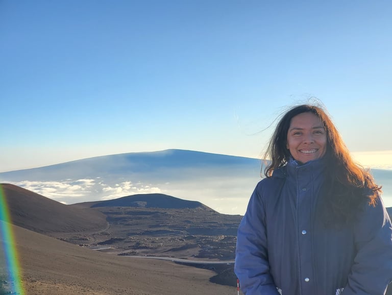 Crystal on Mauna Kea with Mauna Loa