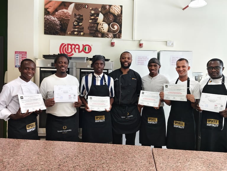 culinary training courses in UAE with chefs receiving certificates in professional kitchen