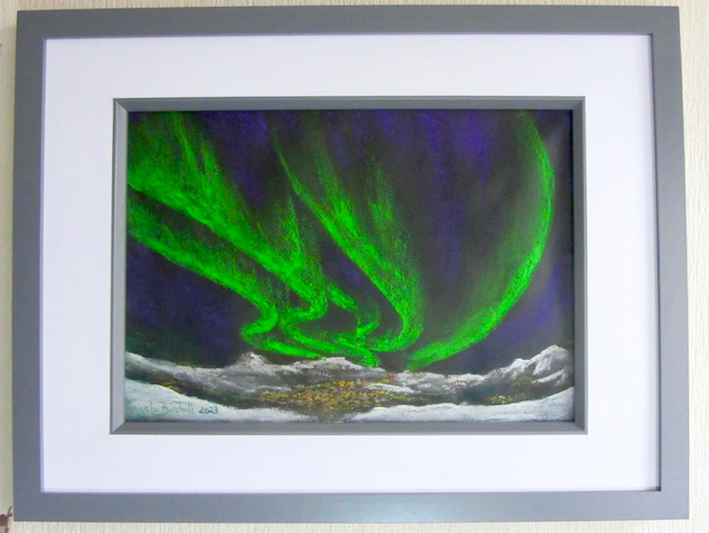 Reflections of the green Northern Lights sweeping down onto a snowy landscape.  Soft pastel on black
