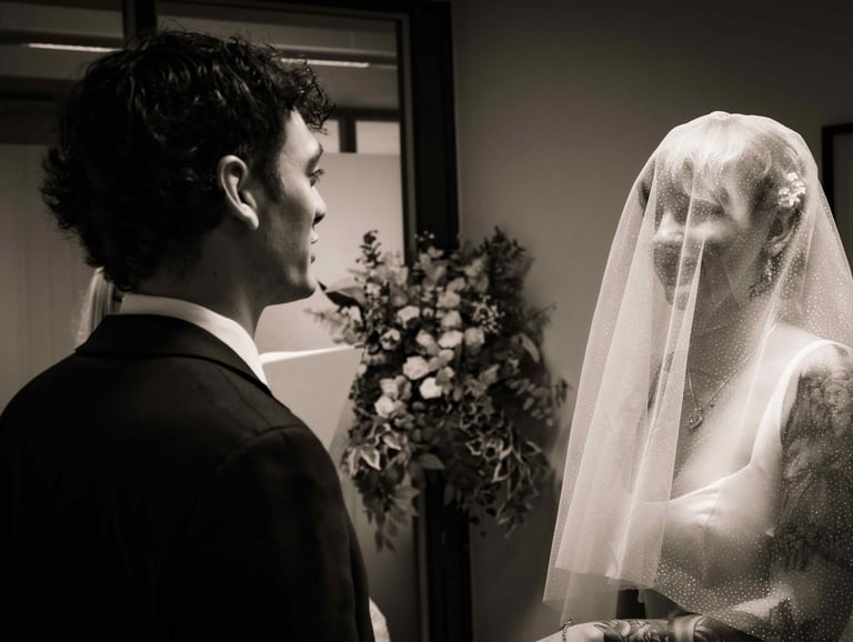 a man and woman in wedding attire