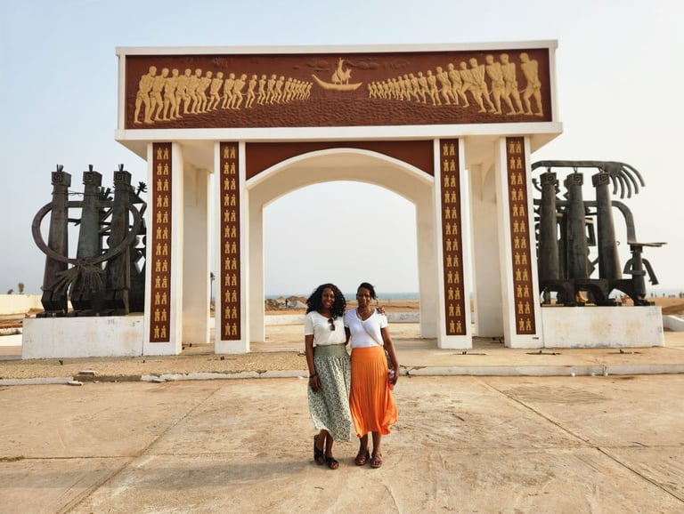 Tourists visiting Slave Door of No Return in Benin