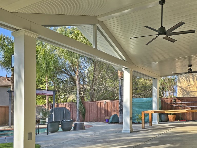 Alumawood shade structure with gable roof line in Menifee, CA designed by SAE Builders.
