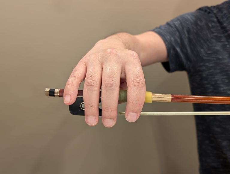 hand dropped on bow stick