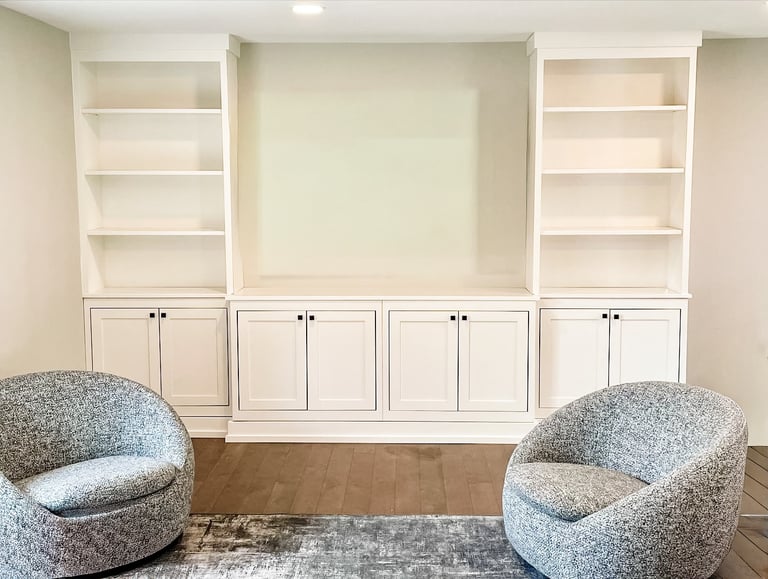 Custom built in wall unit with shelving and cabinetry for a Pearce Woodworks Detroit client.