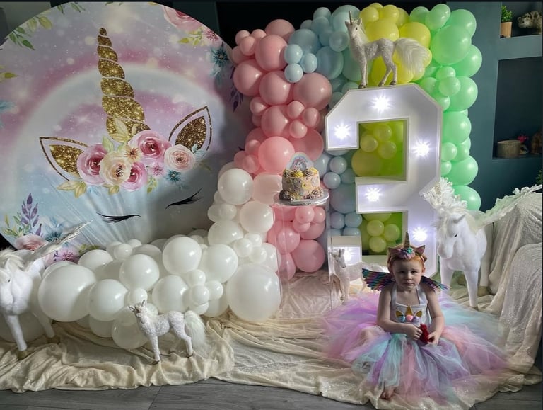 Unicorn and Rainbow themed birthday balloon display for children’s party in Liverpool
