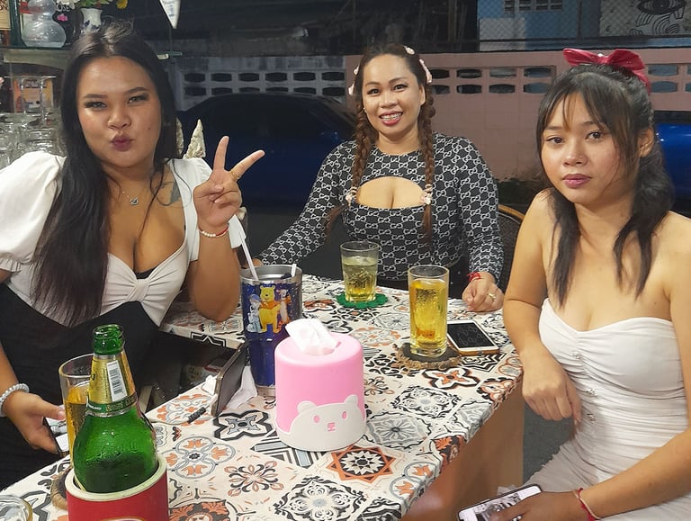 Thai women sat at bar at Nees Tiki Club on Petchkasem Road, Hua Hin