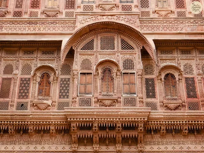 Delicate red sandstone lattice jharokhas of Jhanki Mahal at Mehrangarh Fort Jodhpur.