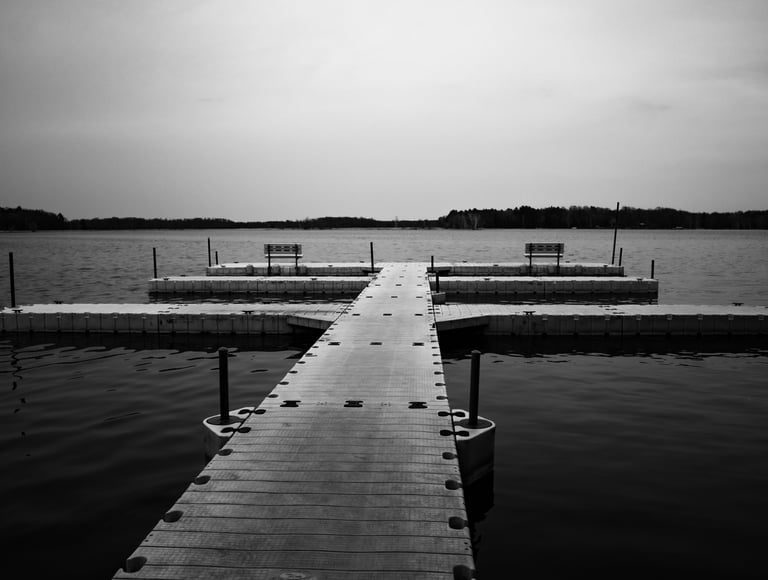 a dock with benches on the Chippewa foliage