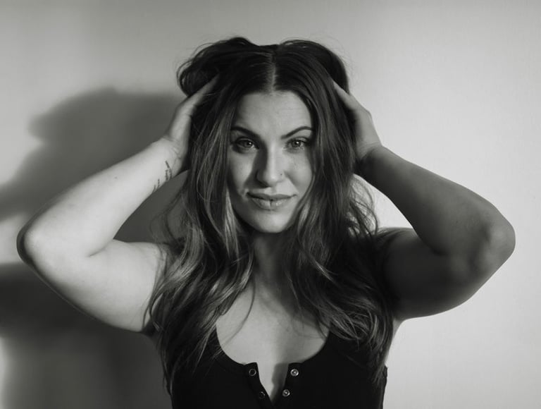 a woman with a black top, modeling photos, portrait