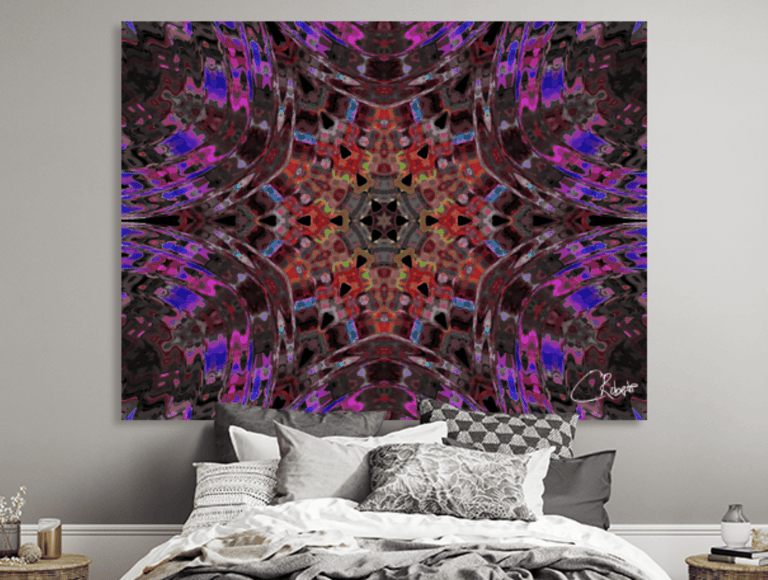 Canvas print on bedroom wall featuring an abstract kaleidoscope design in red, pink & purple hues.  