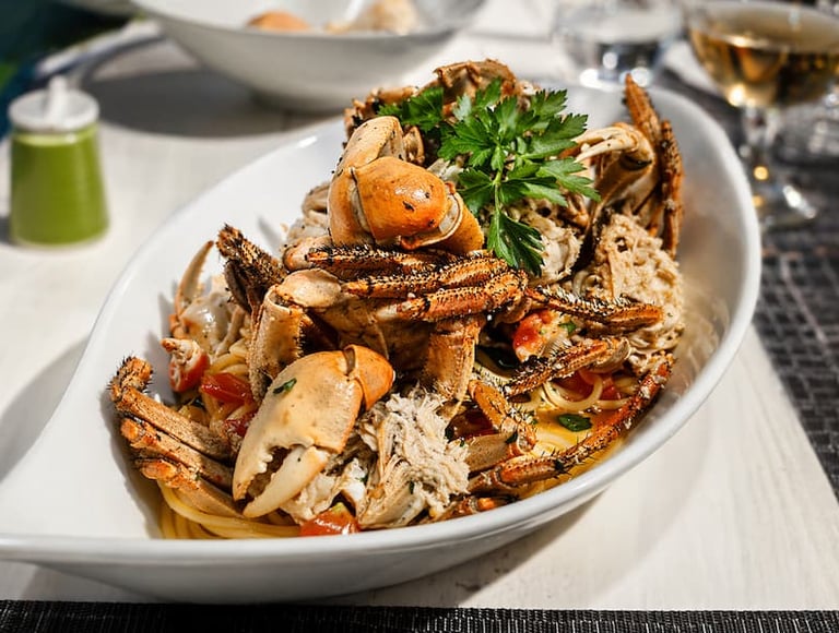 spaghetti-with-fresh-crab-parsley-cherry-tomatoes-big-game-maio