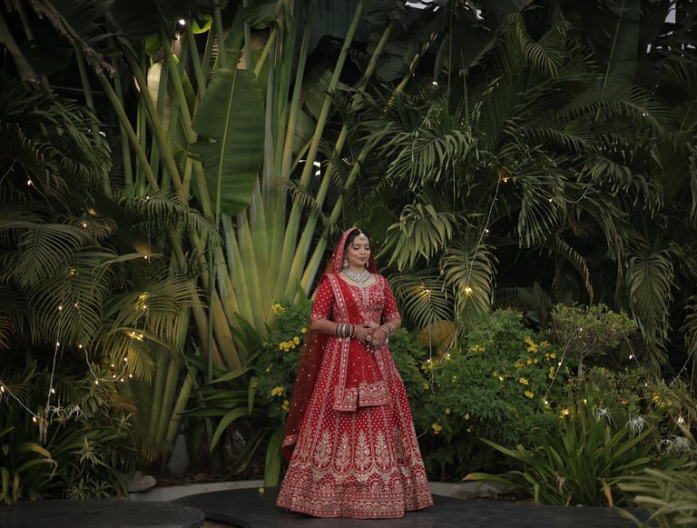 Gujarati bride red lehenga bridal makeup Vadodara, destination wedding and party plot reception brid