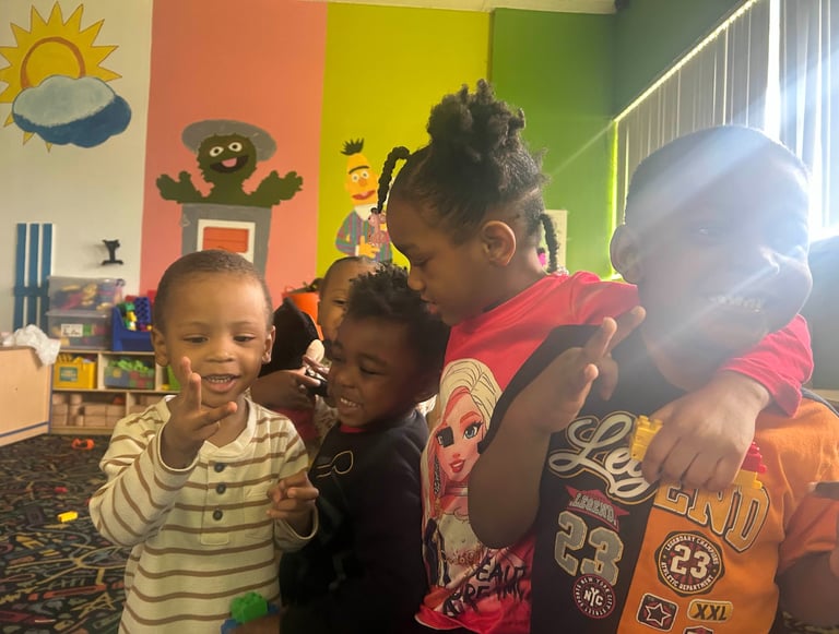 a group of children in a classroom with a teacher