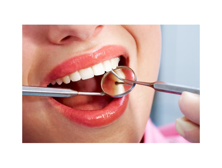 Close-up of a smiling woman with bright white teeth, showcasing a successful dental treatment in Tur