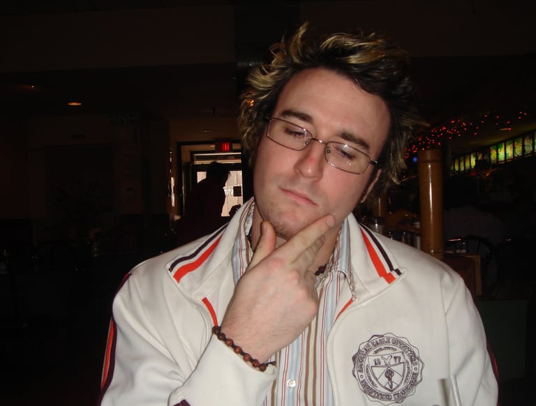 A young man thinking pensively 