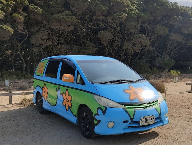 hippie style van or car, typically used by people who like to be on the road, travel alternatively