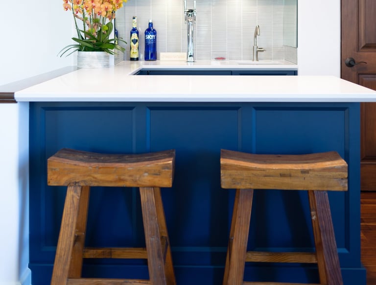 Wet bar transitional cabinets in blue paint