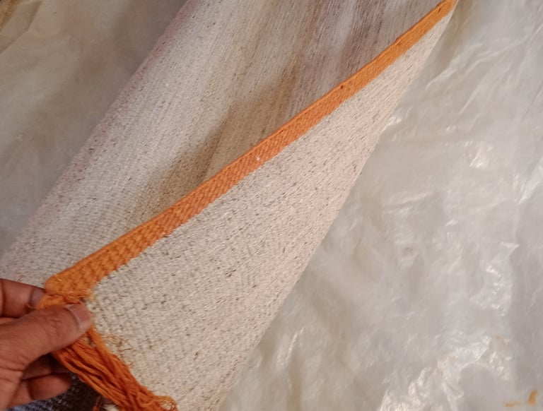 Handmade flat weave rug crafted from premium Nepali Allo fiber