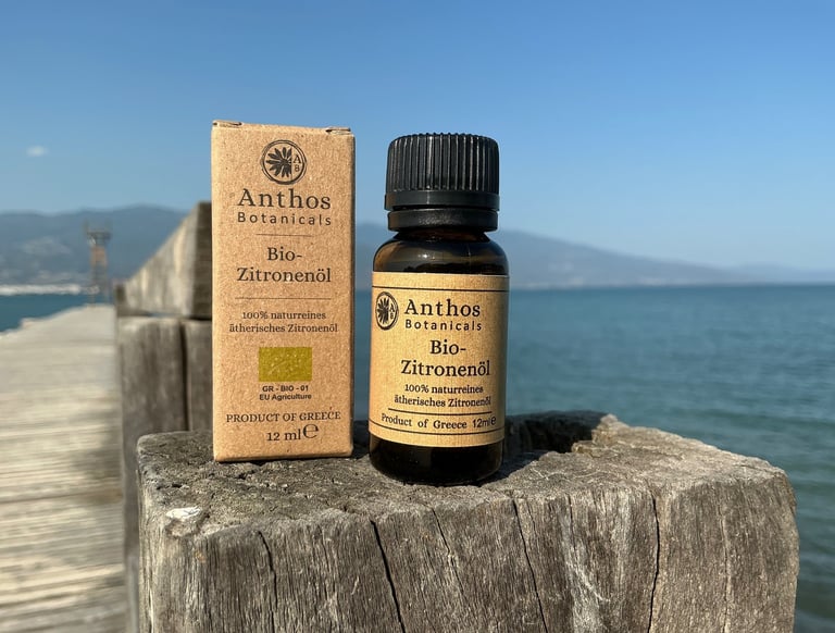 a bottle and a box of lemon essential oil