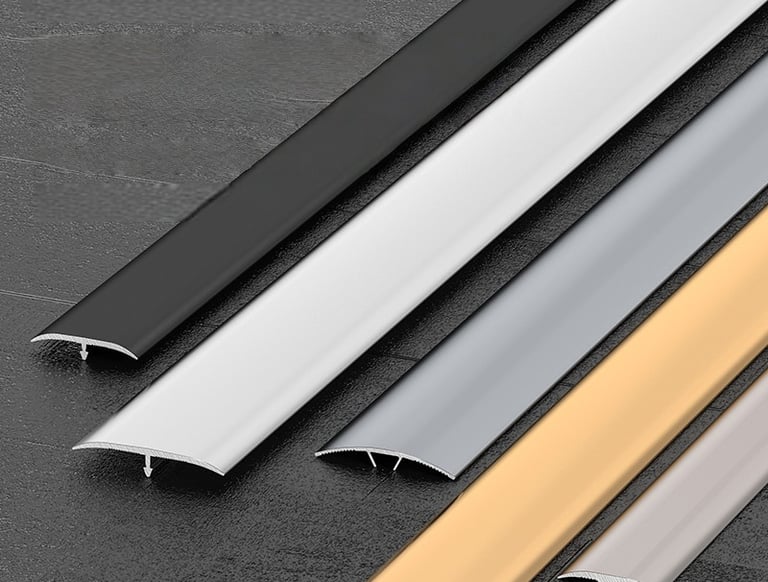 Assorted color floor transition strips - black, white, silver, gold, beige molding trim for flooring edges and gaps