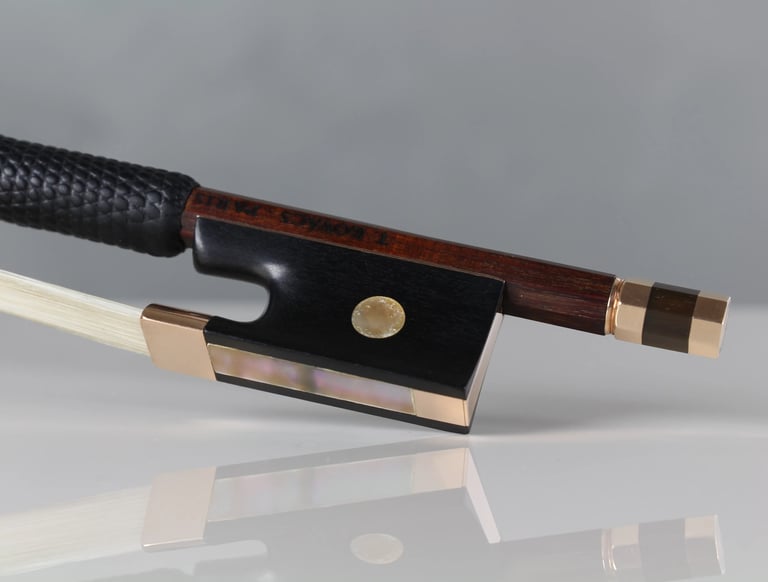 Rehair on gold-mounted modern Paris violin bow