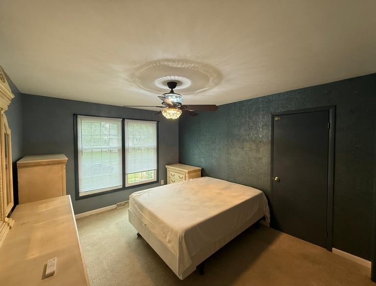 This project we did the whole bedroom, wallpaper in the back walls, new paint on the walls and trims