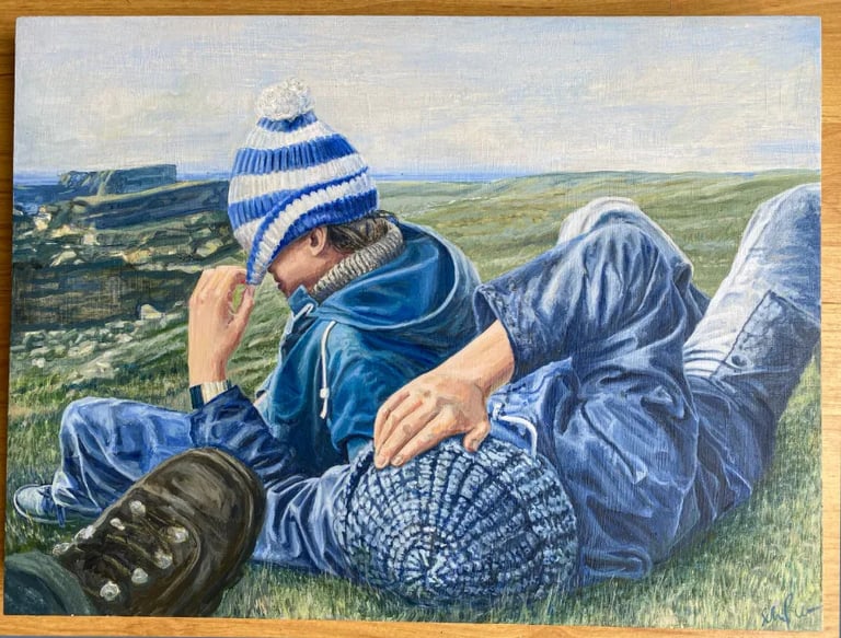 Family portrait hand-painted on poplar board, featuring two boys in jeans playfully teasing each other in a seaside landscape