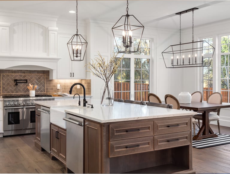 a kitchen with a table and chairs and a table