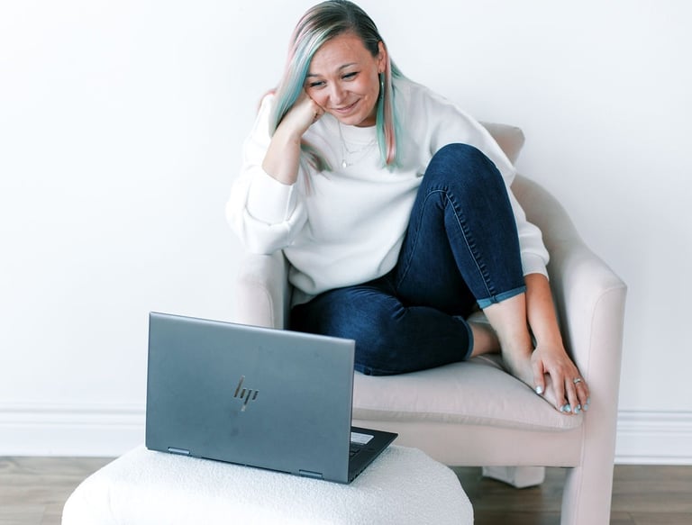 Tabitha with butterfly effect consulting with her laptop talking to a client