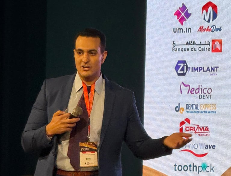 a man in a suit and tie is giving a presentation