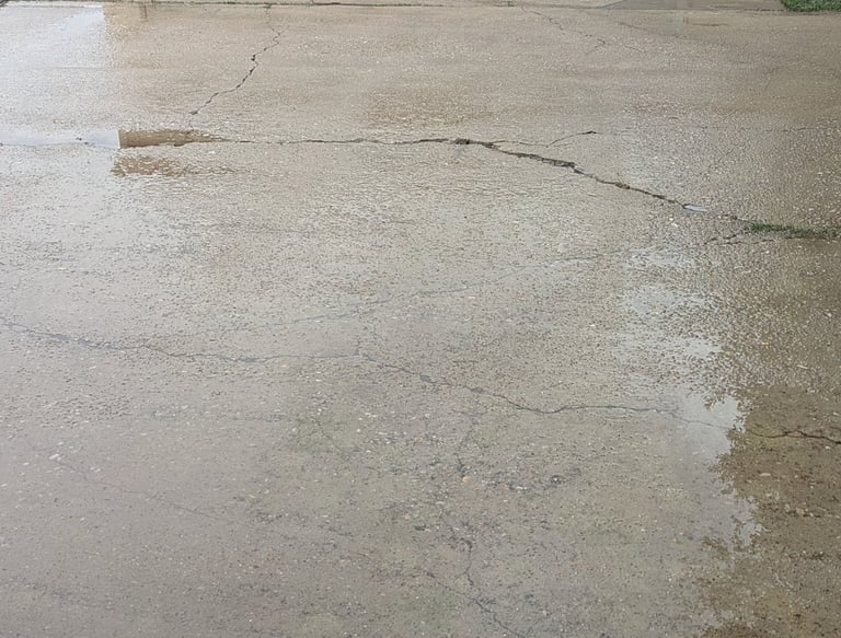 A freshly cleaned driveway included from an actual customer review. Located in Denton Texas.
