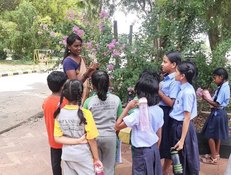 Teacher conducting an English phonics class for children at Little Cubs Learning Academy in Tiruvann