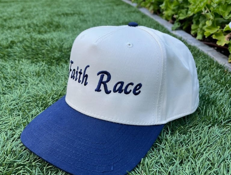 The Admiral Faith Race hat on grass