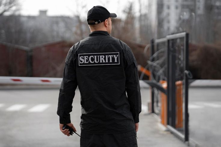 A Security Officer protecting a property premises.
