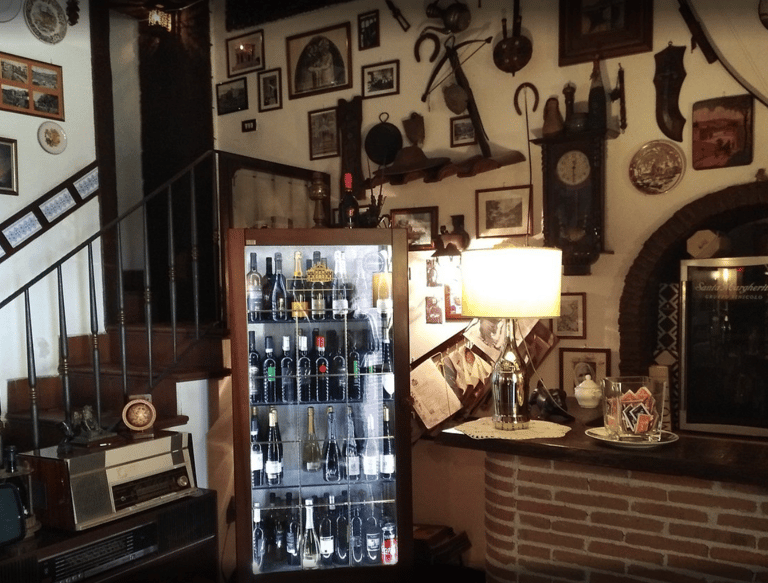 a refrigerator with a glass door and a glass door