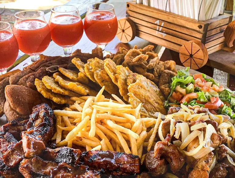 a plate of food with a glass of wine and a glass of wine