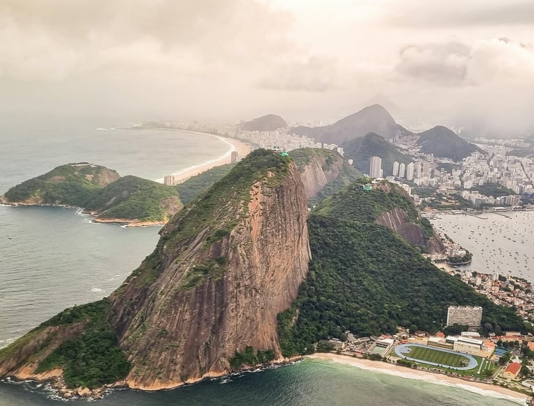 a mountain view of a mountain range with a view of a city, Rio de Janeiro