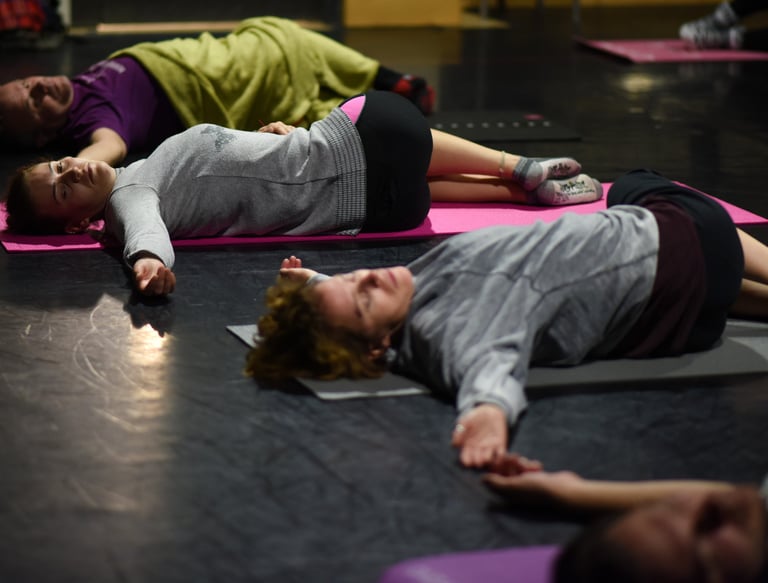 People doing an 'Awareness Through Movement' lesson form the Feldenkrais Methodt