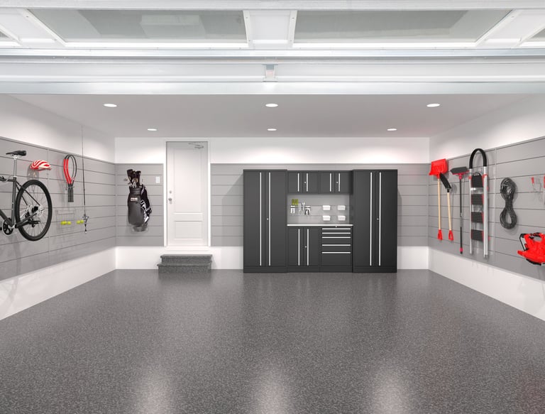 Garage with flake epoxy walls are covered with slatwall