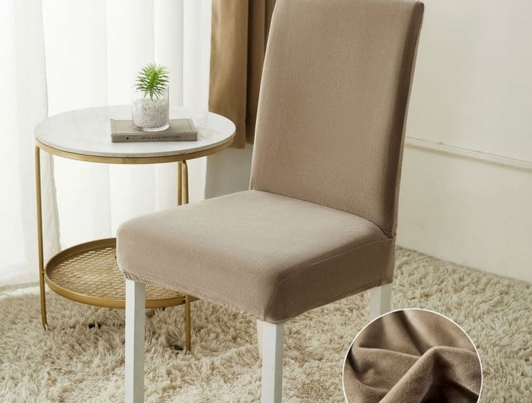 a chair with a chair and a table with a plant in it