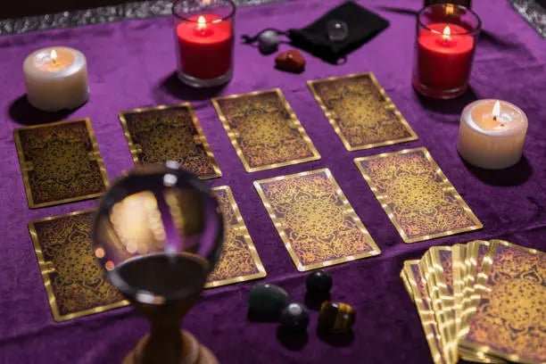 a table with candles and candles on it