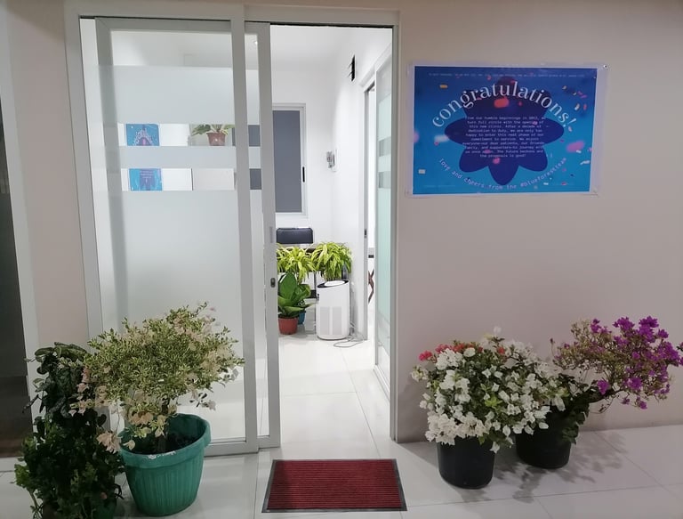 a door way with flowers in a room